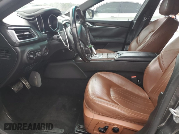 2014 Maserati Ghibli z VIN ZAM57XSA9E1096594, wystawiony jako Copart lot #47187285 z przebiegiem 114 050 mil mil oraz Szkody całkowita. Historia ofert i sprzedaży dostępna na DreamBid. Obrazek 7.