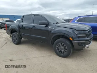 2023 Ford Ranger XL with VIN 1FTER4FH5PLE32303, listed as a Copart auction lot 52417505 with 26,392 mi miles and Salvage title. Bid and sale history available at DreamBid. Image 4.