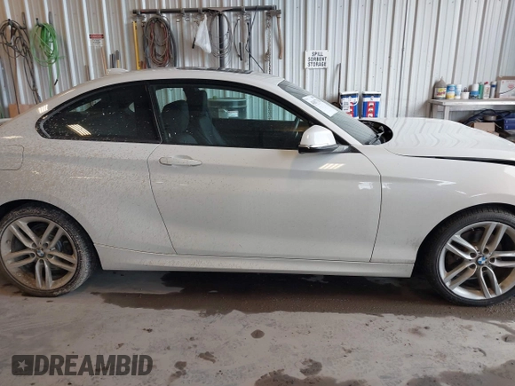2016 BMW 2 Series 228i xDrive with VIN WBA1G9C53GVX97088, listed as a IAAI auction lot 41617710 with 72,978 mi miles and . Bid and sale history available at DreamBid. Image 14.