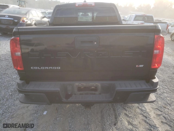 2021 Chevrolet Colorado 2WD Z71 with VIN 1GCGSDEN2M1243233, listed as a Copart auction lot 75515154 with 70,679 mi miles and Salvage Title. Bid and sale history available at carsss.com. Image 6.