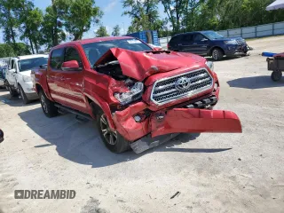 2017 Toyota Tacoma SR5 with VIN 5TFAZ5CN5HX051995, listed as a Copart auction lot 52018825 with 96,963 mi miles and Salvage Title. Bid and sale history available at DreamBid. Image 4.