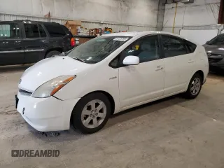 2008 Toyota Prius z VIN JTDKB20U183348868, wystawiony jako Copart lot #59105705 z przebiegiem 216 774 mil mil oraz Nie do naprawy • Non repairable. Historia ofert i sprzedaży dostępna na DreamBid. Obrazek 1.