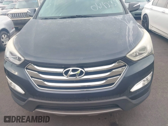 2013 Hyundai Santa Fe Sport z VIN 5XYZU3LAXDG064239, wystawiony jako IAAI lot #42296861 z przebiegiem 165 872 mil mil oraz . Historia ofert i sprzedaży dostępna na DreamBid. Obrazek 6.