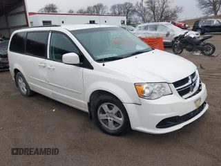 2012 Dodge Grand Caravan SXT with VIN 2C4RDGCG8CR361080, listed as a IAAI auction lot 41216245 with 229,873 mi miles and . Bid and sale history available at DreamBid. Image 1.