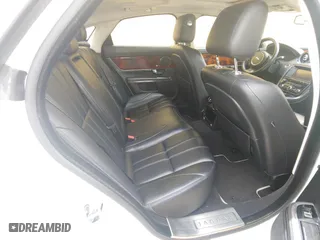 2013 Jaguar XJ with VIN SAJWJ1CD7D8V49599, listed as a Copart auction lot 54008915 with 133,163 mi miles and Clean Title. Bid and sale history available at carsss.com. Image 6.