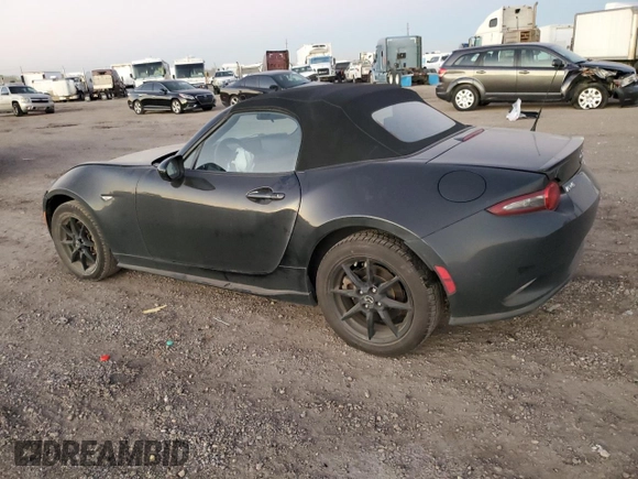 2021 Mazda MX-5 Miata Sport with VIN JM1NDAB79M0454876, listed as a Copart auction lot 82086434 with 74,035 mi miles and Salvage title. Bid and sale history available at DreamBid. Image 2.