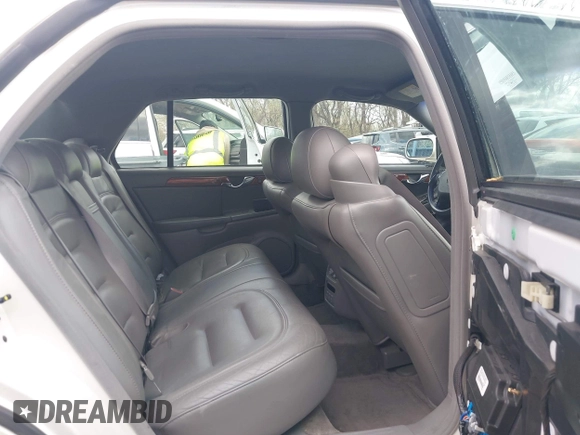 2003 Cadillac DeVille z VIN 1G6KD54Y13U208351, wystawiony jako IAAI lot #41889713 z przebiegiem 132 774 mil mil oraz . Historia ofert i sprzedaży dostępna na DreamBid. Obrazek 8.