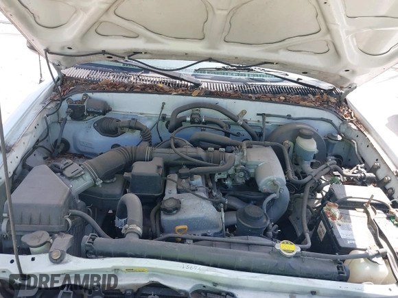 2002 Toyota Tacoma z VIN 5TENL42N62Z033844, wystawiony jako IAAI lot #42403317 z przebiegiem 130 961 mil mil oraz . Historia ofert i sprzedaży dostępna na DreamBid. Obrazek 10.