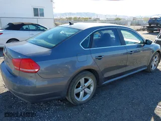 2012 Volkswagen Passat SE with VIN 1VWBP7A31CC008775, listed as a IAAI auction lot 41353437 with 118,815 mi miles. Bid and sale history available at carsss.com. Image 4.