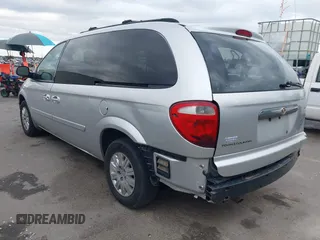 2007 Chrysler Town & Country with VIN 2A4GP44R27R191148, listed as a IAAI auction lot 42171218 with 150,670 mi miles and . Bid and sale history available at DreamBid. Image 3.