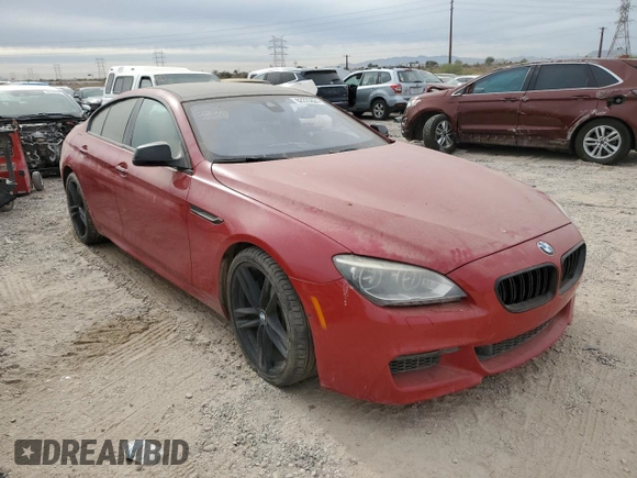 2013 BMW 6 Series 650i with VIN WBA6B2C50DDG66703, listed as a Copart auction lot 82225824 with 199,076 mi miles and Salvage Title. Bid and sale history available at DreamBid. Image 4.