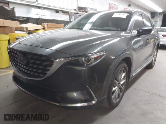 2017 Mazda CX-9 Grand Touring z VIN JM3TCADY2H0134070, wystawiony jako IAAI lot #41611243 z przebiegiem 87 046 mil mil oraz . Historia ofert i sprzedaży dostępna na DreamBid. Obrazek 17.