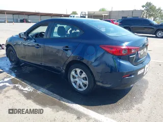 2014 Mazda 3 i SV with VIN JM1BM1T74E1117576, listed as a IAAI auction lot 42062701 with 107,528 mi miles and . Bid and sale history available at DreamBid. Image 3.