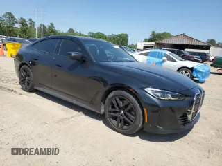 2023 BMW 4 Series 430i xDrive with VIN WBA73AV01PFN88144, listed as a Copart auction lot 53514735 with 61,582 mi miles and Salvage title. Bid and sale history available at DreamBid. Image 4.