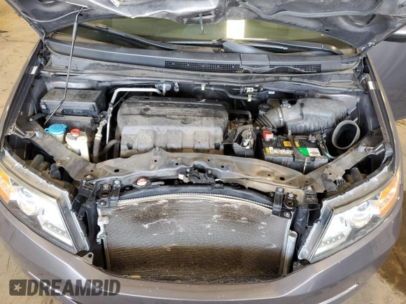 2014 Honda Odyssey EX-L with VIN 5FNRL5H6XEB134849, listed as a Copart auction lot 63617435 with 127,491 mi miles and Salvage title. Bid and sale history available at DreamBid. Image 12.