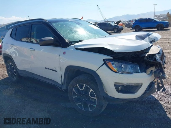 2021 Jeep Compass Trailhawk with VIN 3C4NJDDB0MT551172, listed as a IAAI auction lot 40155947 with 50,794 mi miles and . Bid and sale history available at DreamBid. Image 1.