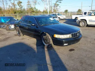 2002 Cadillac Seville Luxury SLS z VIN 1G6KS54Y82U305194, wystawiony jako IAAI lot #40978923 z przebiegiem 115 813 mil mil oraz . Historia ofert i sprzedaży dostępna na DreamBid. Obrazek 1.