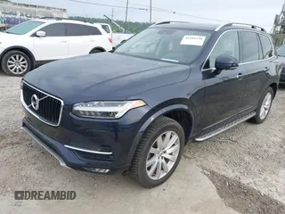 2016 Volvo XC90 T6 Momentum with VIN YV4A22PK7G1058660, listed as a IAAI auction lot 42201130 with 130,487 mi miles. Bid and sale history available at carsss.com. Image 2.