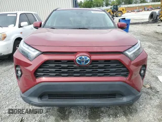 2022 Toyota RAV4 Hybrid XLE Premium with VIN 4T3B6RFV5NU074838, listed as a Copart auction lot 56697215 with 61,309 mi miles and Salvage title. Bid and sale history available at DreamBid. Image 5.