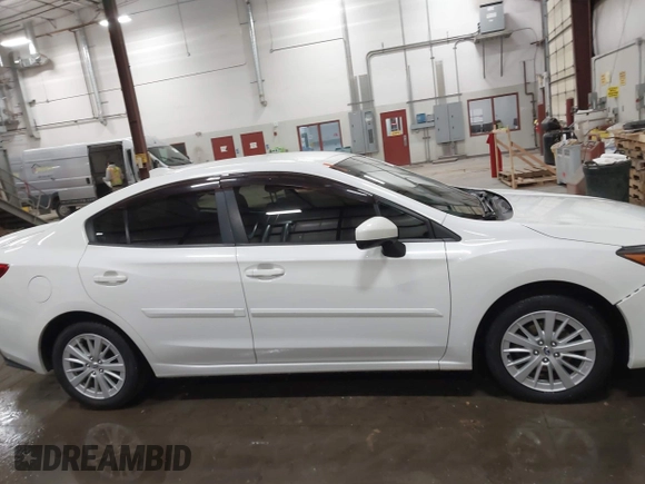 2018 Subaru Impreza Premium z VIN 4S3GKAB68J3610714, wystawiony jako IAAI lot #41774380 z przebiegiem 114 745 mil mil oraz . Historia ofert i sprzedaży dostępna na DreamBid. Obrazek 12.