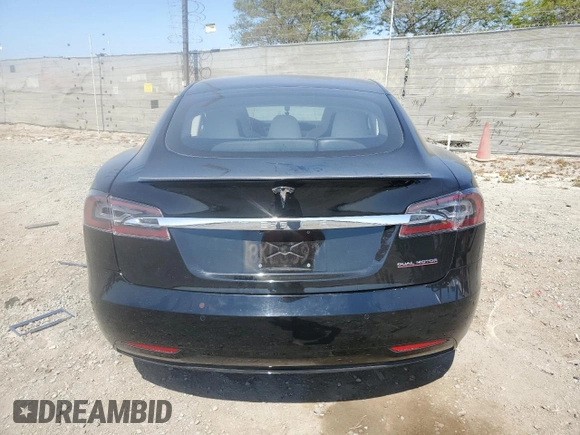 2019 Tesla Model S 100D with VIN 5YJSA1E42KF331240, listed as a Copart auction lot 54713975 with 43,940 mi miles and Salvage title. Bid and sale history available at DreamBid. Image 6.