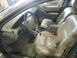 1999 Chrysler Cirrus LXi z VIN 1C3EJ56H6XN600228, wystawiony jako Copart lot #86002314 z przebiegiem 42 402 mil mil oraz Tytuł czysty. Historia ofert i sprzedaży dostępna na DreamBid. Obrazek 7.