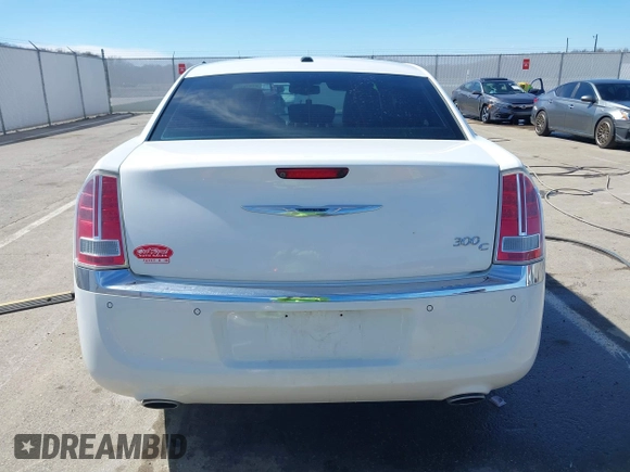 2011 Chrysler 300 with VIN 2C3CA6CTXBH559626, listed as a IAAI auction lot 41876062 with 112,045 mi miles. Bid and sale history available at carsss.com. Image 17.