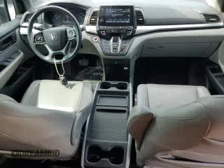 2019 Honda Odyssey EX-L z VIN 5FNRL6H72KB012691, wystawiony jako Copart lot #54739695 z przebiegiem 115 129 mil mil oraz Szkody całkowita. Historia ofert i sprzedaży dostępna na DreamBid. Obrazek 8.
