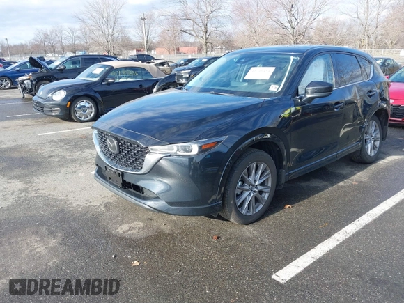 2024 Mazda CX-5 2.5 S Premium Package with VIN JM3KFBDM3R0400333, listed as a IAAI auction lot 41741454 with 14,116 mi miles. Bid and sale history available at carsss.com. Image 2.