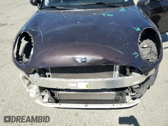 2015 MINI Hardtop 4 Door z VIN WMWXS5C57FT829133, wystawiony jako Copart lot #58764405 z przebiegiem 63 774 mil mil oraz Szkoda całkowita • Salvage title. Historia ofert i sprzedaży dostępna na DreamBid. Obrazek 11.