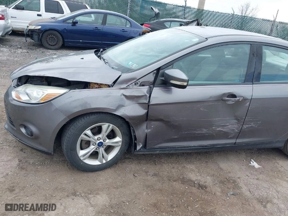 2014 Ford Focus SE with VIN 1FADP3F22EL395592, listed as a IAAI auction lot 41915197 with 103,537 mi miles. Bid and sale history available at carsss.com. Image 6.