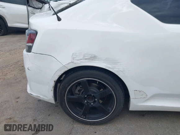 2014 Scion tC with VIN JTKJF5C79E3075707, listed as a IAAI auction lot 41557310 with 132,468 mi miles. Bid and sale history available at carsss.com. Image 6.