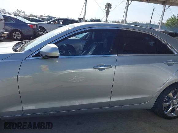 2014 Cadillac ATS Standard RWD with VIN 1G6AA5RXXE0110031, listed as a IAAI auction lot 42100955 with 82,109 mi miles. Bid and sale history available at carsss.com. Image 15.