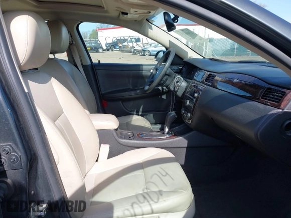 2015 Chevrolet Impala LTZ with VIN 2G1WC5E35F1142321, listed as a IAAI auction lot 42090274 with 109,972 mi miles and . Bid and sale history available at DreamBid. Image 5.