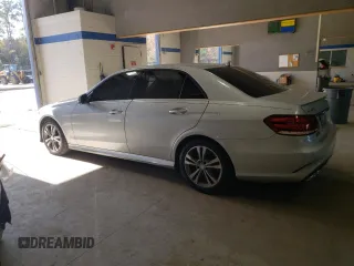 2014 Mercedes-Benz E 400 Sport with VIN WDDHF9FB3EA947278, listed as a Copart auction lot 80728934 with 108,824 mi miles and Salvage Title. Bid and sale history available at DreamBid. Image 2.