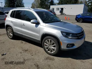 2012 Volkswagen Tiguan SE z VIN WVGAV7AXXCW513800, wystawiony jako Copart lot #53005945 z przebiegiem 155 920 mil mil oraz Tytuł czysty. Historia ofert i sprzedaży dostępna na DreamBid. Obrazek 4.