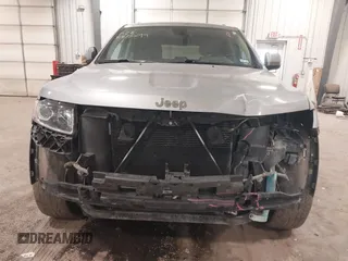 2015 Jeep Grand Cherokee Laredo with VIN 1C4RJFAG4FC797069, listed as a IAAI auction lot 41435299 with 146,755 mi miles. Bid and sale history available at carsss.com. Image 6.