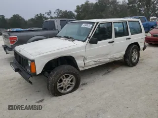 1996 Jeep Cherokee SE z VIN 1J4FJ28S7TL256478, wystawiony jako Copart lot #47164985 z przebiegiem 195 800 mil mil oraz Nie do naprawy. Historia ofert i sprzedaży dostępna na DreamBid. Obrazek 1.