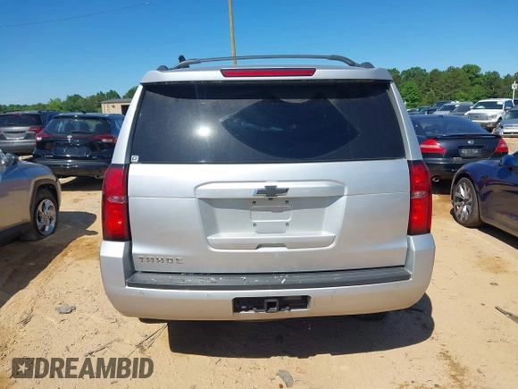 2020 Chevrolet Tahoe LT with VIN 1GNSKBKC5LR121085, listed as a IAAI auction lot 42341677 with 123,579 mi miles and . Bid and sale history available at DreamBid. Image 16.