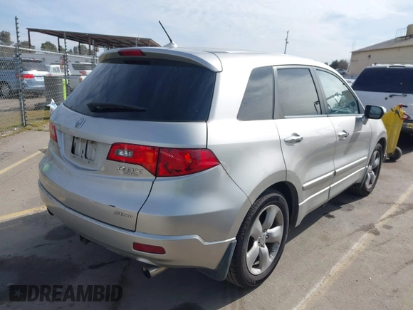 2009 Acura RDX with VIN 5J8TB18259A003794, listed as a IAAI auction lot 41551523 with 159,453 mi miles and . Bid and sale history available at carsss.com. Image 4.