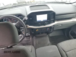 2021 Ford F-150 XL z VIN 1FTMF1E5XMKE93125, wystawiony jako Copart lot #79877134 z przebiegiem 61 418 mil mil oraz Nie do naprawy • Non repairable. Historia ofert i sprzedaży dostępna na DreamBid. Obrazek 8.