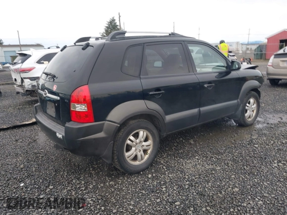 2006 Hyundai Tucson GLS with VIN KM8JN72D66U338658, listed as a IAAI auction lot 41828712 with 198,185 mi miles. Bid and sale history available at carsss.com. Image 4.