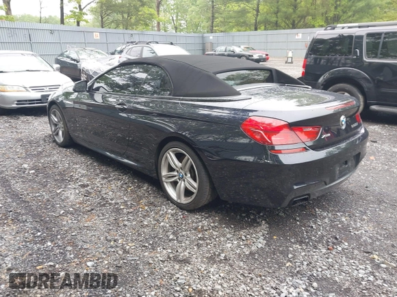 2017 BMW 6 Series 650i xDrive z VIN WBA6F7C52HD930816, wystawiony jako IAAI lot #42168478 z przebiegiem 89 191 mil mil oraz . Historia ofert i sprzedaży dostępna na DreamBid. Obrazek 3.