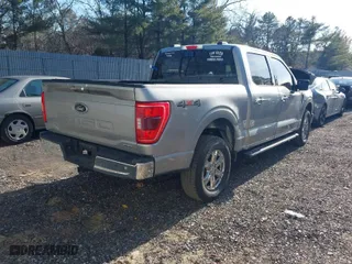 2021 Ford F-150 XL with VIN 1FTFW1E85MKD11754, listed as a IAAI auction lot 41654622 with 33,756 mi miles. Bid and sale history available at carsss.com. Image 4.