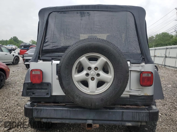 2004 Jeep Wrangler X with VIN 1J4FA39S24P714961, listed as a Copart auction lot 57871235 with 123,164 mi miles and Clean title. Bid and sale history available at DreamBid. Image 6.