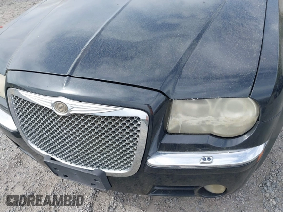2006 Chrysler 300 C with VIN 2C3KA63H36H455735, listed as a IAAI auction lot 41875033 with 175,251 mi miles. Bid and sale history available at carsss.com. Image 6.