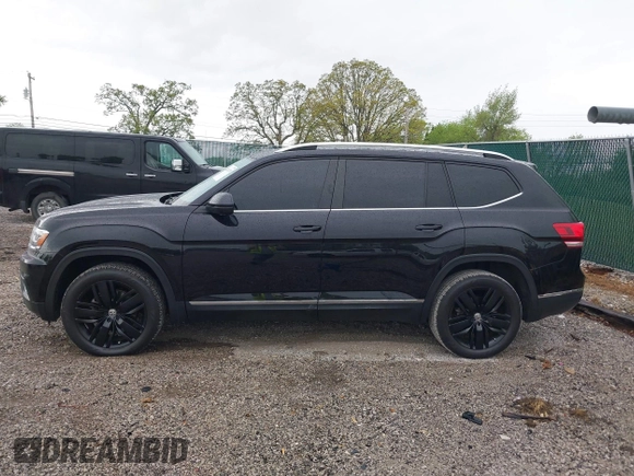 2019 Volkswagen Atlas SEL z VIN 1V2ER2CA2KC592691, wystawiony jako IAAI lot #42011478 z przebiegiem 57 628 mil mil oraz . Historia ofert i sprzedaży dostępna na DreamBid. Obrazek 14.