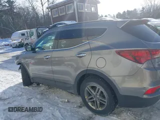 2017 Hyundai Santa Fe 2.4L with VIN 5NMZUDLB4HH034437, listed as a IAAI auction lot 41565545 with 96,640 mi miles and . Bid and sale history available at DreamBid. Image 14.