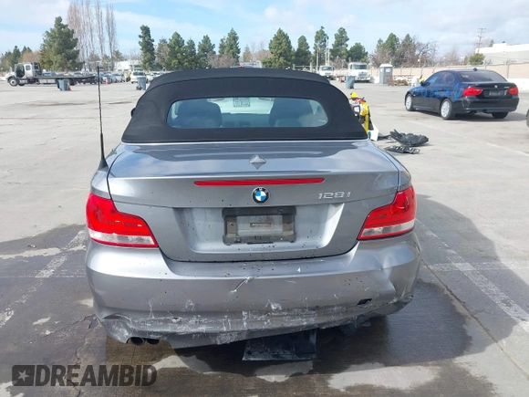 2012 BMW 1 Series 128i with VIN WBAUN1C52CVR00421, listed as a IAAI auction lot 41594256 with 107,957 mi miles and . Bid and sale history available at DreamBid. Image 16.