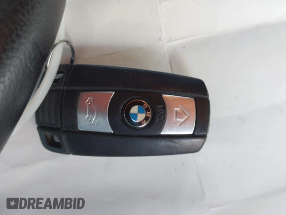 2009 BMW 3 Series 328i with VIN WBAPH57559NL77104, listed as a IAAI auction lot 41707276 with 146,170 mi miles and . Bid and sale history available at DreamBid. Image 11.